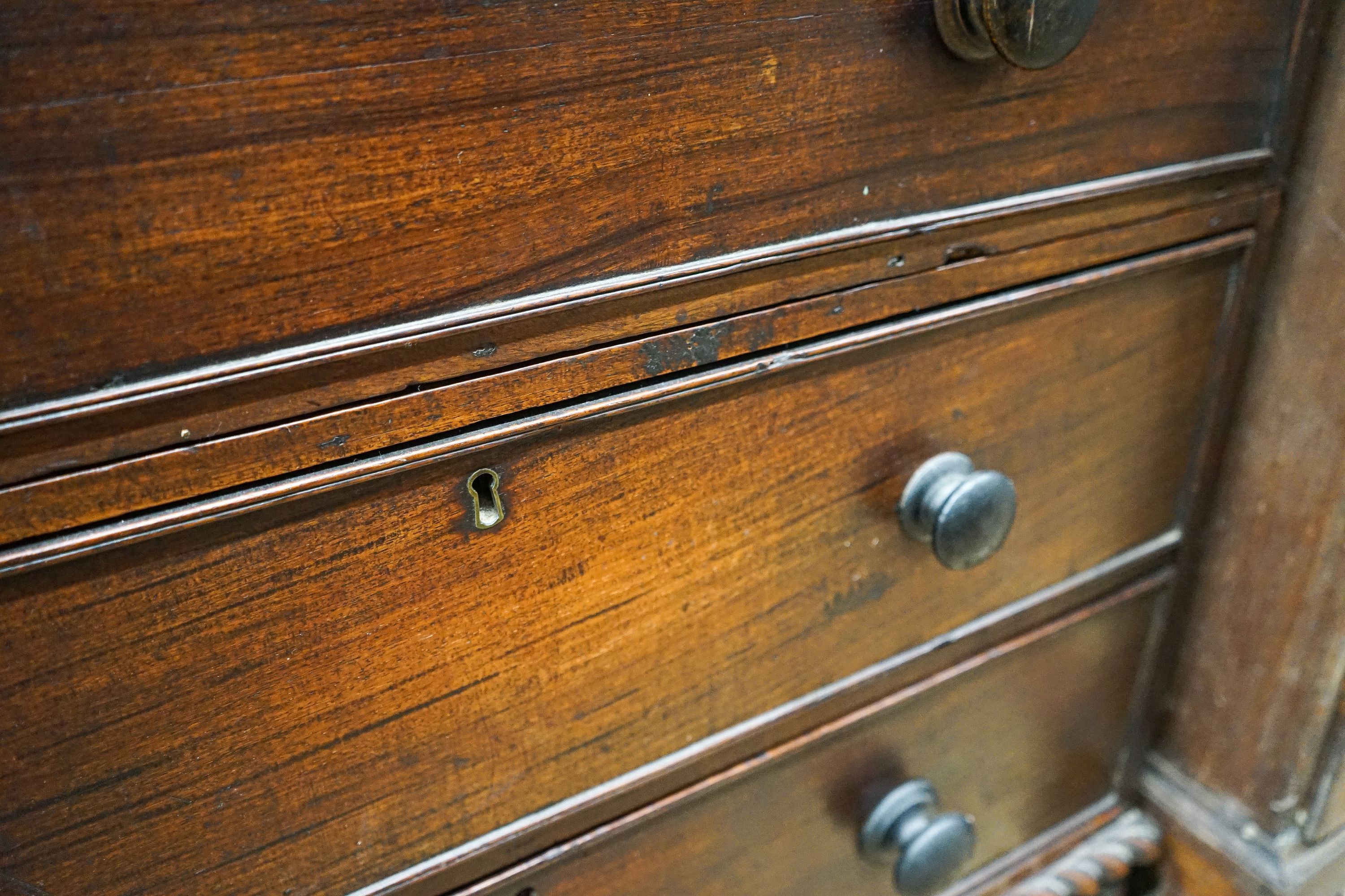 A 19th century Anglo Indian padouk two part chest with gadrooned decoration, width 96cm, depth 43cm, height 106cm